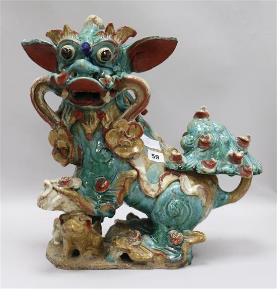 A large Chinese stoneware figure of a lion-dog height 43cm